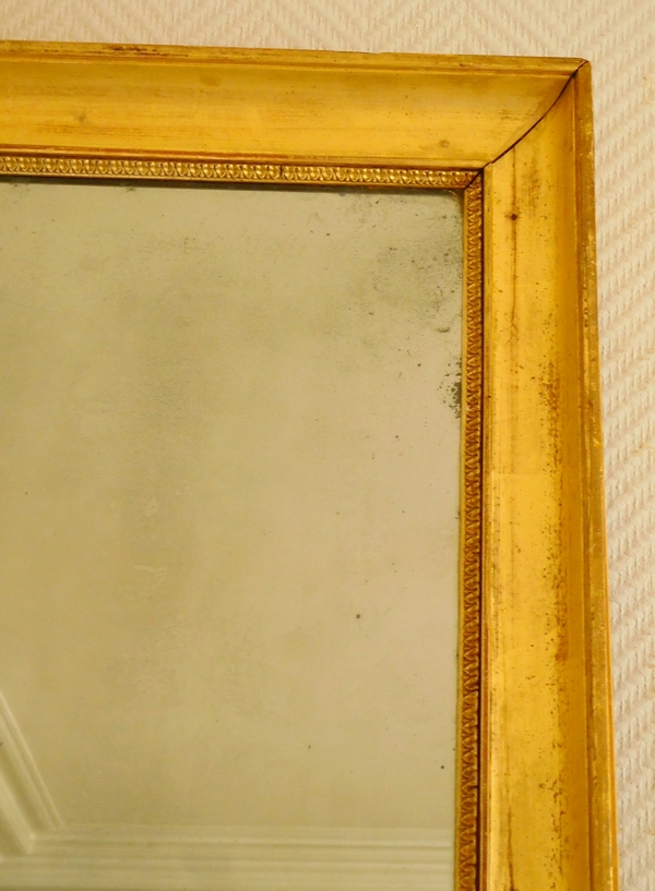 Miroir d'entre deux ou de cheminée d'époque Empire en bois doré, glace au mercure - 141cm x 76cm